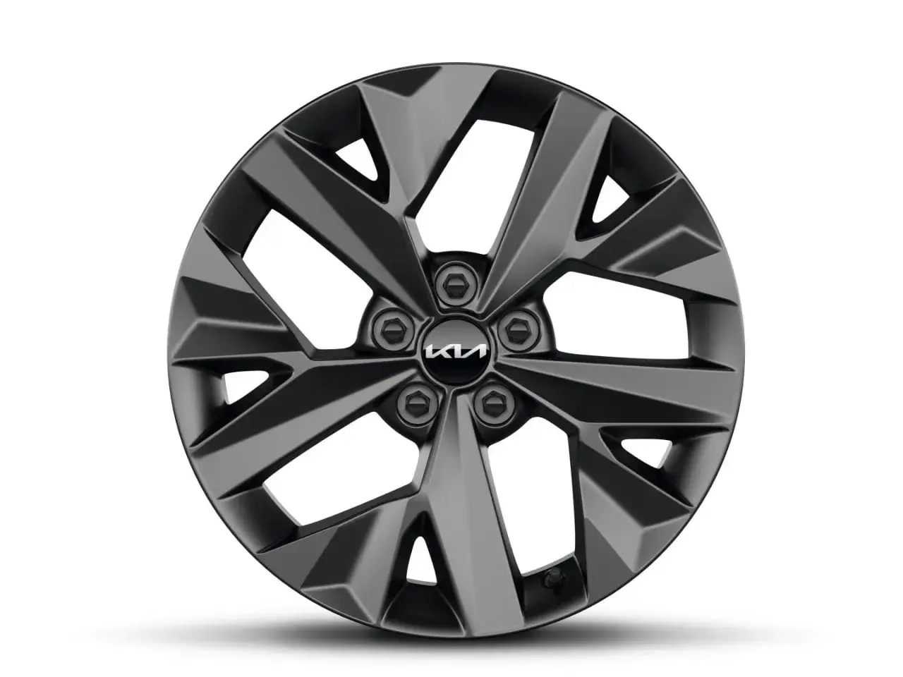 Ciemnoszara felga Kia Sportage GT Line z pięcioramiennym, geometrycznym wzorem i nowym logo Kia.