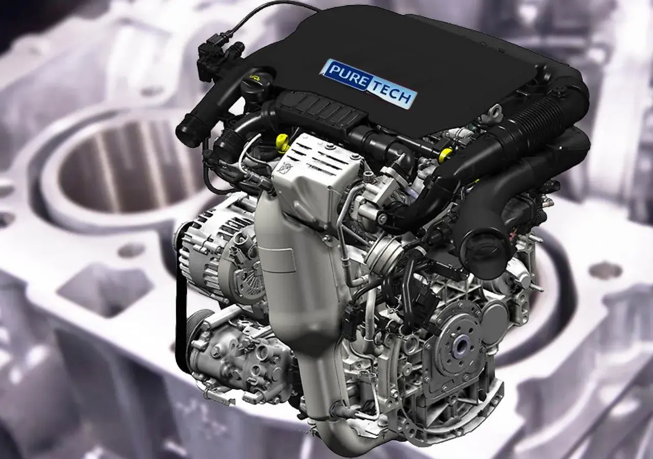 Nowoczesny silnik 1.2 PureTech z widocznym logo. Skomplikowana konstrukcja z licznymi elementami i przewodami.